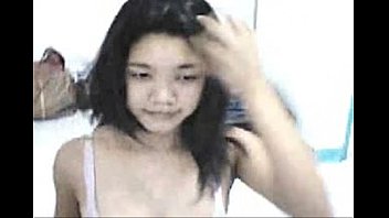 Asian Teen Rubs Her Pussy Until It's Dripping Wet