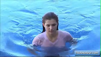 Amazing natural busty teen amateur Fiona takes a swim in her pool and play with her nipples